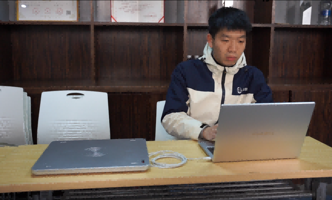 store staff receiving RFID system training for apparel retail management